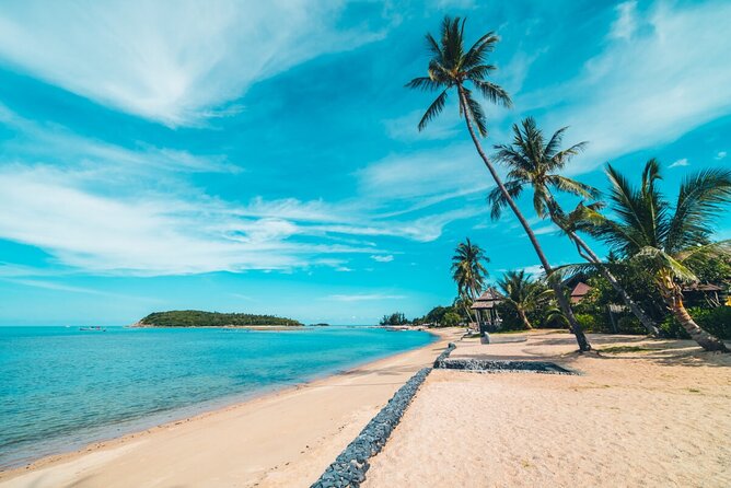 4x4 Adventure Tour, Mountains and Paradise Beaches with Food - Stop 1: Emerald Coast Beach for Calm Water and Coconut Groves