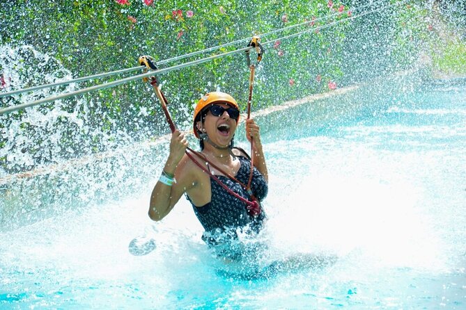 Buggy Adventure with Cenote, Waterfalls & Dominican Lunch - Blue Lagoon cenote swim and waterfall pool: cool down the right way