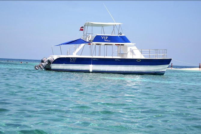 Cayo Arena Catamaran Cruise from Puerto Plata with Lunch - The catamaran cruise: comfort, crew energy, and “floating bar” time