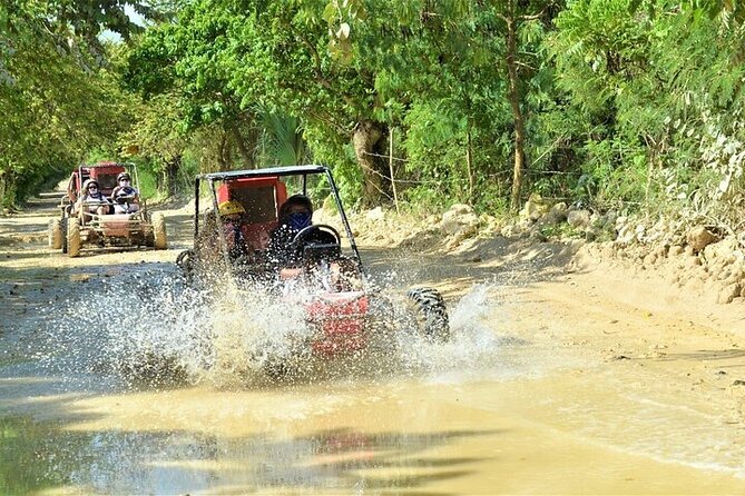Dune Buggy Tour in Punta Cana DR - Cave swim with cool lights and DJ energy