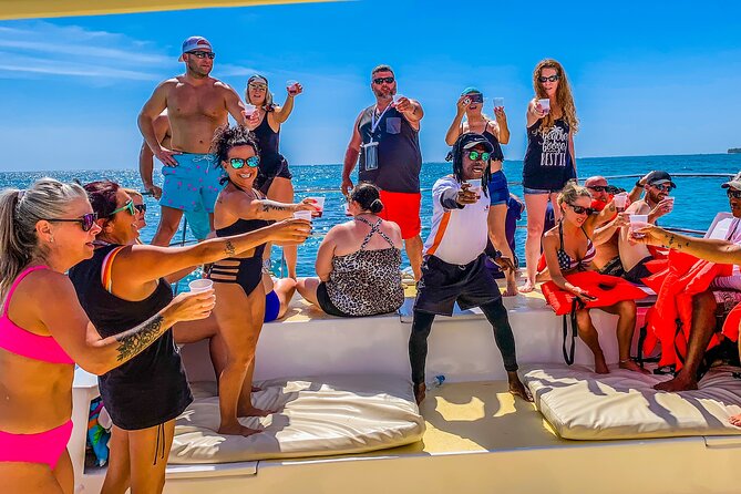 Float & Feast Private Party Cruise with Premium Buffet & Open Bar - Getting There: pickup, a quick souvenir stop, and smooth check-in