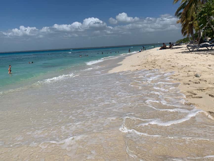 From Punta Cana: Catalina Island Swim, Sail & Snorkel - Getting there: the bus, headsets, and the no-luggage rule