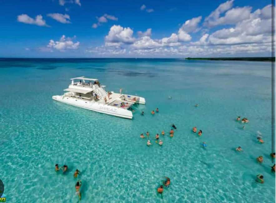 From Punta Cana: Saona Island Boat Trip with Buffet - On the water: crew energy and the best views
