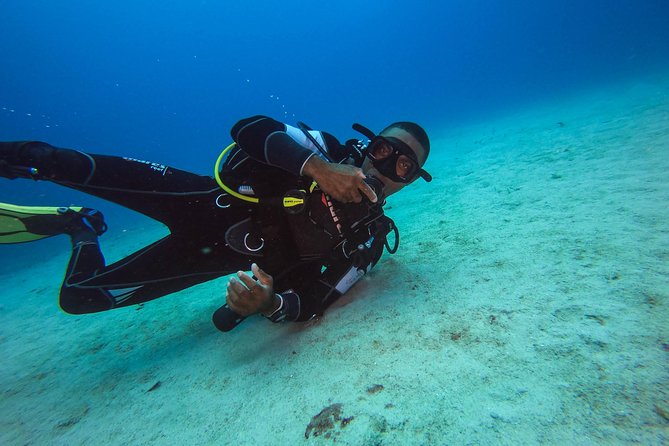Full-Day Scuba Diving Catalina Island Tour from Bavaro - Drinks, photos, and small extras that affect your total spend