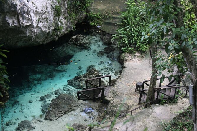 Full Day Tour to the Blue Lagoon and 7 Different Destinations - Playa Caleton: rocky crescent beauty and Taino chief faces