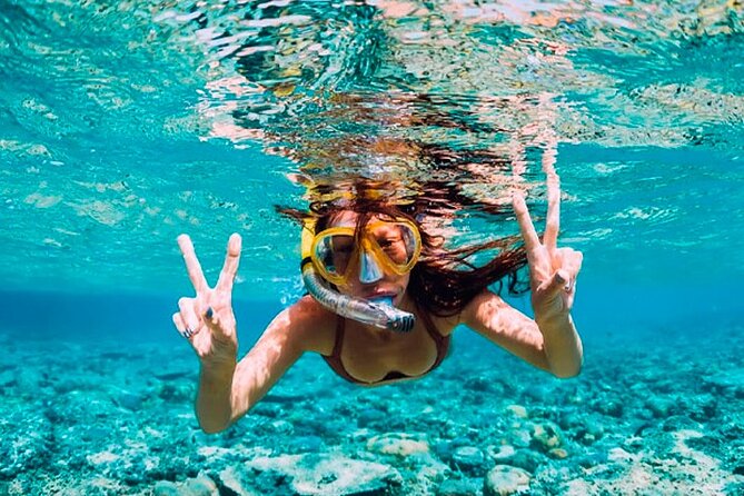 Guided Saona Island Tour in Punta Cana - Saona Island stops: private beach, Atlantic Princess snorkeling, and the natural pool