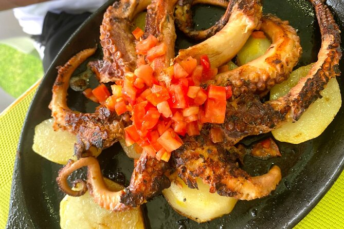 Half Day Punta Cana Food Tour Including Transportation - Stop 2 in Punta Cana: sancocho, seafood/meat options, and mofongo’s garlic power