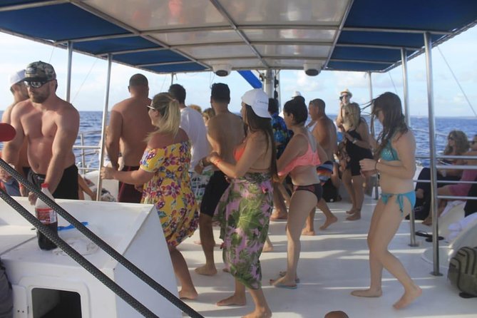 Party boat in Catamaran with Open Bar Only Adults + Snorkeling - Open bar, music, and the adults-only vibe: verify before you go