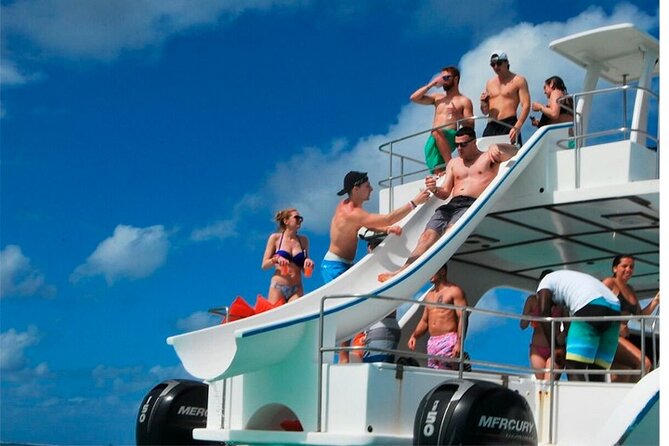 Party Boat in Punta Cana with Drinks and Transportation Included - Stop 1 in Punta Cana: Dolphin Viewing From the Boat (15 Minutes)