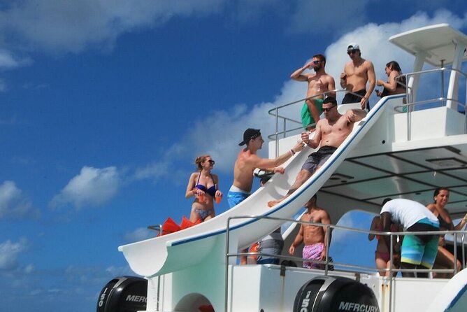 Party Boat /View Dolphins / Snorkling /Free Drinks and Transportation - What’s Included: Open Bar, Slides, and Snorkel Gear