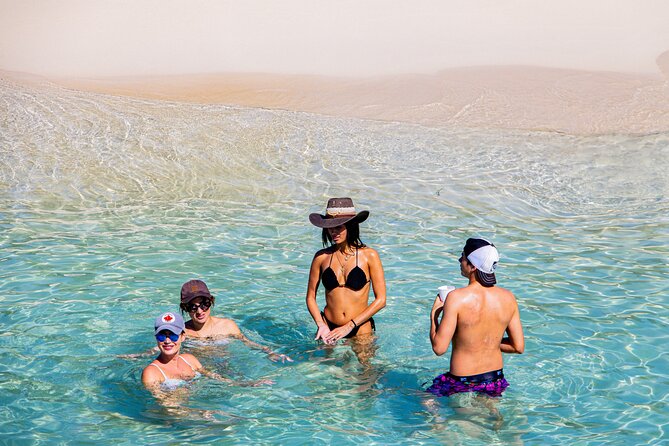 Private Catamaran + Private Parasailing - up to 20 passengers - The yacht ride before you fly: drinks, snacks, and that music-in-motion feel