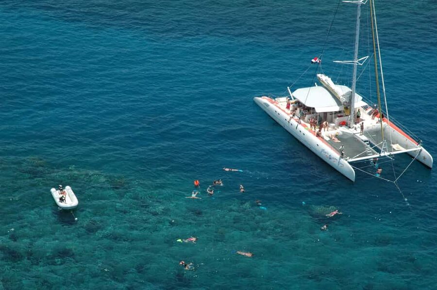Puerto Plata: Sosúa Catamaran Day Trip with Lunch and Drinks - Snorkeling stop: gear is included, but reefs can vary