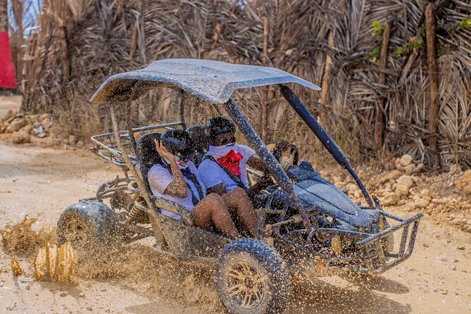 Punta Cana 4 Hours Buggy Tour Cave Macao Beach Free Pick Up - Cueva Taína (Los Hoyos del Salado): the cave swim moment