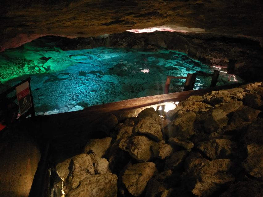 Punta Cana: Blue Hole and Scape Park Cap Cana Entry Ticket - Cave Expedition and Cultural Route: jungle stairs, tunnels, and Taino markings