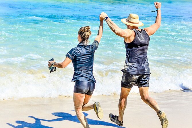 Punta Cana Dune Buggy Adventure and Amazing Water Cave - Macao Beach finish: mud rinse, photos, and quick sand time