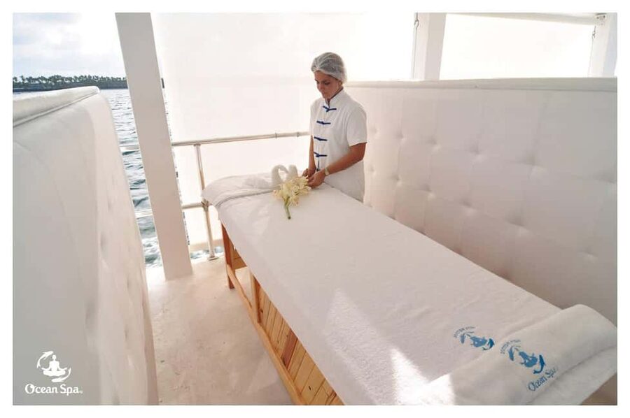 Punta Cana Floating Ocean Spa Experience with Massage & Yoga - Entering the Ocean Spa Catamaran Scene