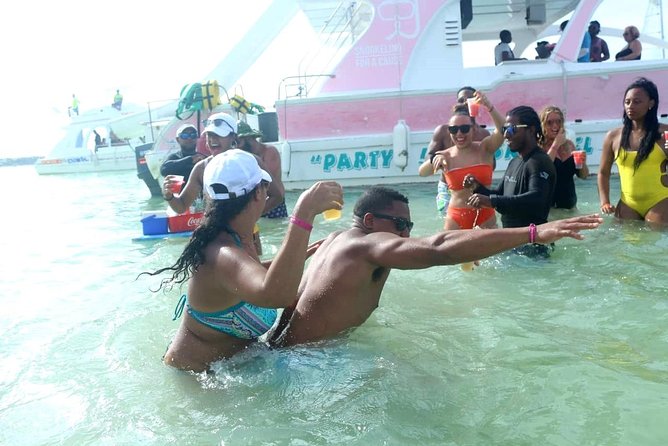 Punta Cana Private Booze Cruise with Open Bar (10+ People) - The pink party boat, slide, and open bar: what the fun really means