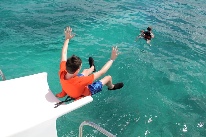 Punta Cana VIP Party Cruise with Snorkeling & Double Slide - The natural swimming pool after snorkeling: snacks, cocktails, and easy wading