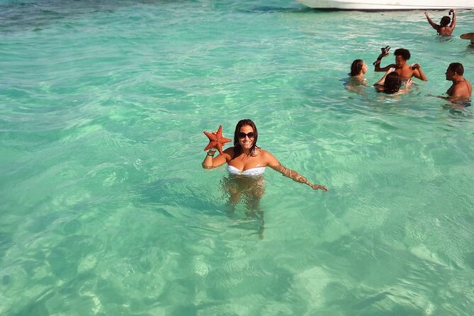 Saona Island Adventure From Punta Cana With Lunch and Transportation - Return Catamaran Party: Music, Snacks, and Dancing for 1.5 Hours