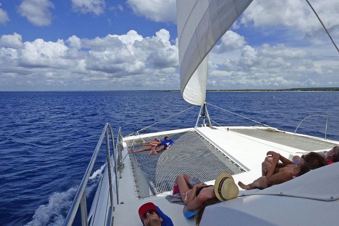 Saona Island small group and relax - luxury catamaran - Saona Island beach time: chairs, drinks, and a palm-forest walk