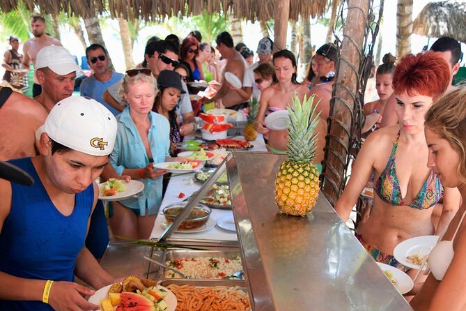 Saône Island from Punta Cana Catamaran, Natural Pool and Lunch - Catamaran ride: music, drinks, and how to make the time feel short