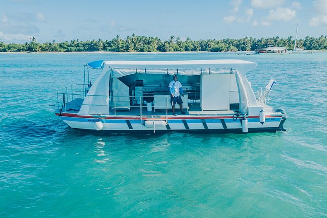 Snorkel Lovers for All Ages & Premium Seafood Lunch in Punta Cana - Stop One at the Natural Pool: Shallow Water Snorkeling and Boat Slide Time