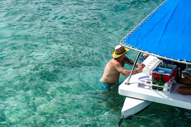 Snorkeling and Swimming on a Caribbean Cruise by Sharky Catamarans - Stop One in Punta Cana: Natural Pool Time and the Coyote Floating Bar