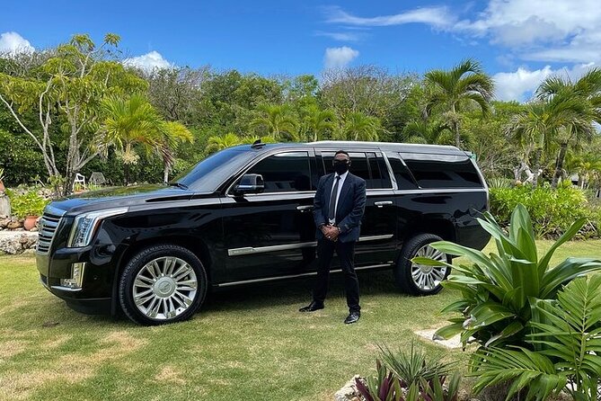 Uvero Alto Luxury and Safety VIP Cadillac transfer - VIP Arrival at Punta Cana Airport (PUJ) With a Name-Folder Meet